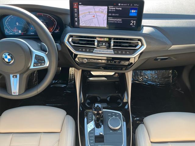 used 2025 BMW X4 car, priced at $60,891