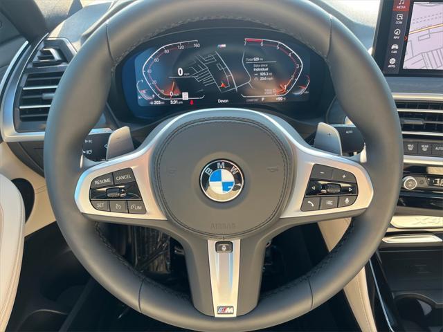 used 2025 BMW X4 car, priced at $60,891