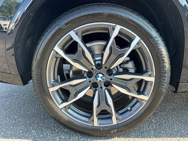 used 2025 BMW X4 car, priced at $60,891