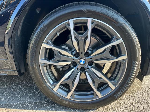 used 2025 BMW X4 car, priced at $60,891
