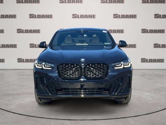 used 2025 BMW X4 car, priced at $60,891