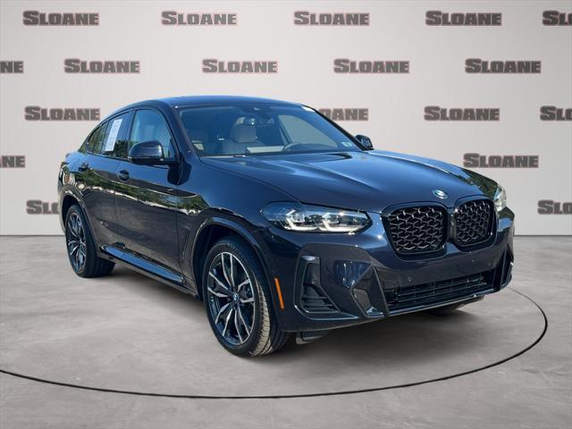 used 2025 BMW X4 car, priced at $60,891