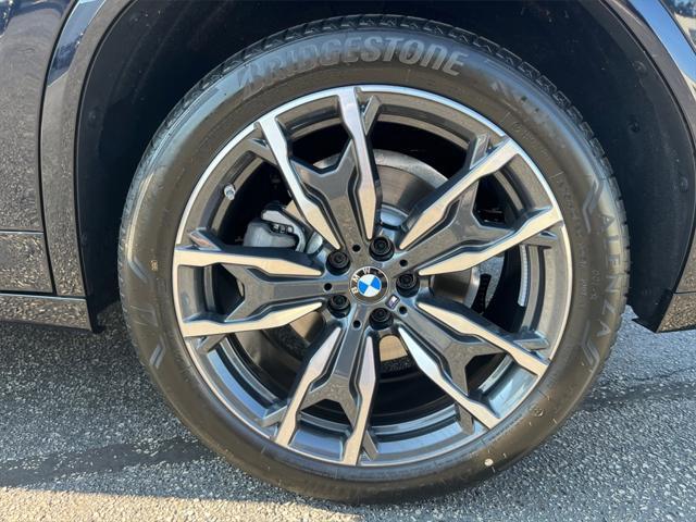 used 2025 BMW X4 car, priced at $60,891
