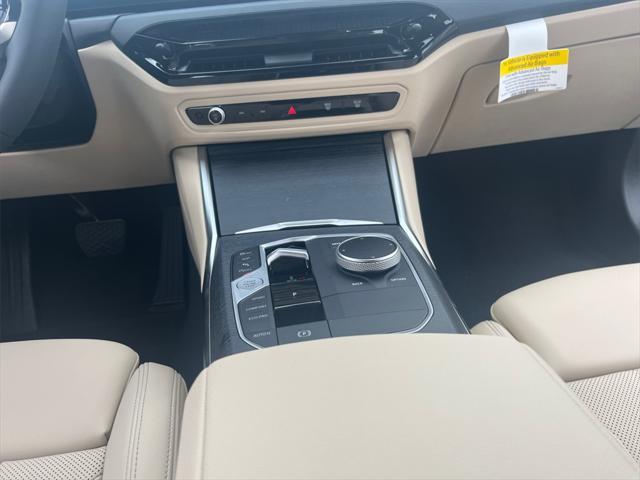new 2025 BMW 330 car, priced at $53,295