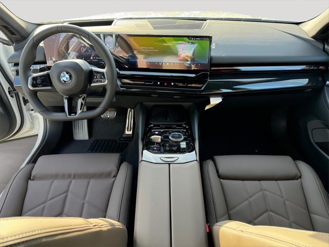 new 2025 BMW 530 car, priced at $70,970