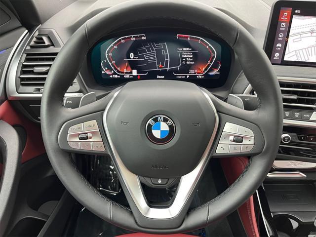 used 2024 BMW X4 car, priced at $50,981