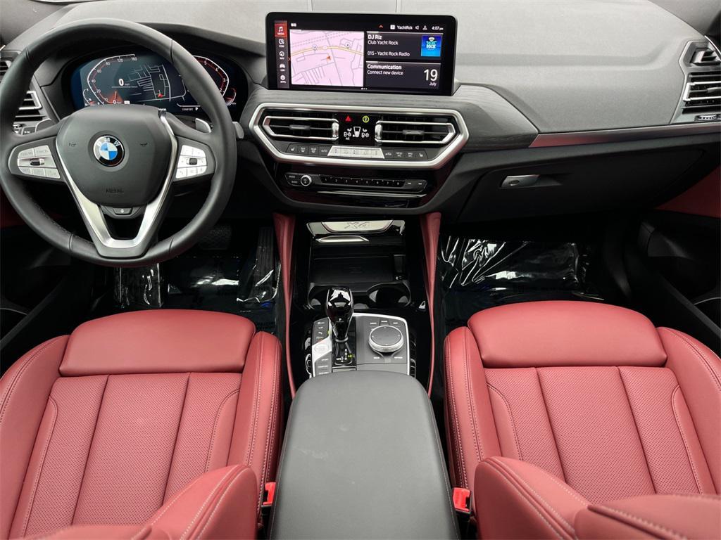 used 2024 BMW X4 car, priced at $49,392