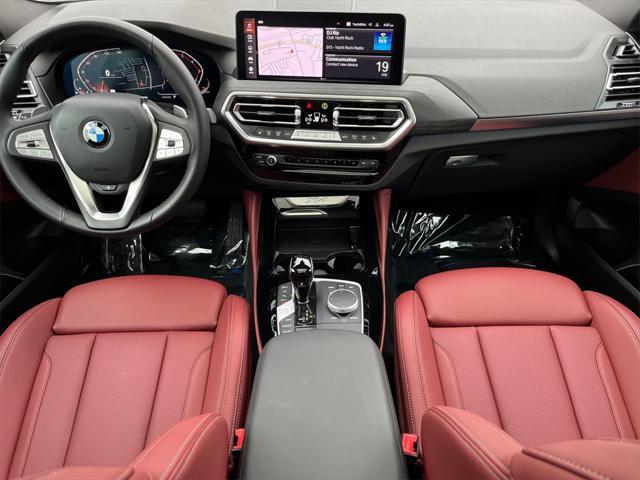 used 2024 BMW X4 car, priced at $50,981