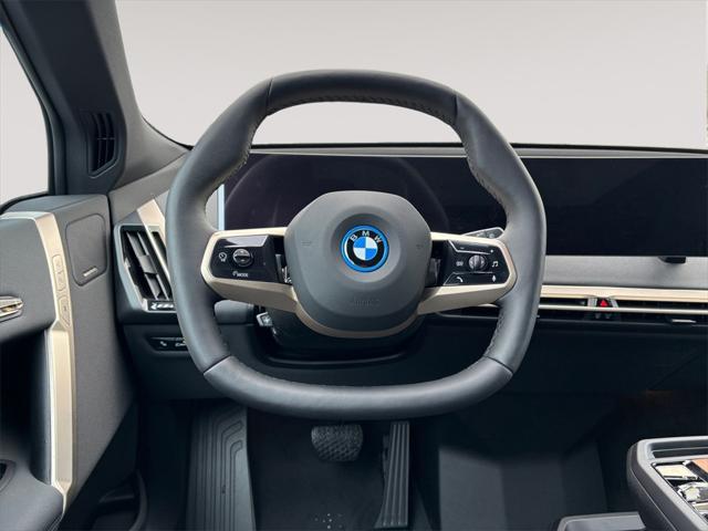 new 2024 BMW iX car, priced at $94,010