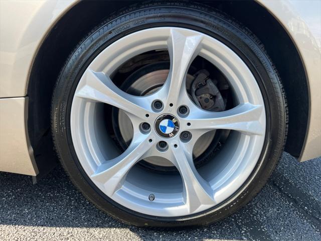 used 2011 BMW Z4 car, priced at $16,892