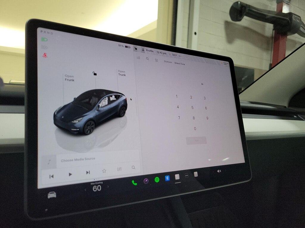 used 2025 Tesla Model Y car, priced at $43,998