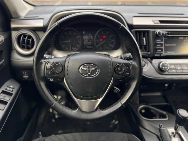 used 2018 Toyota RAV4 car, priced at $20,000