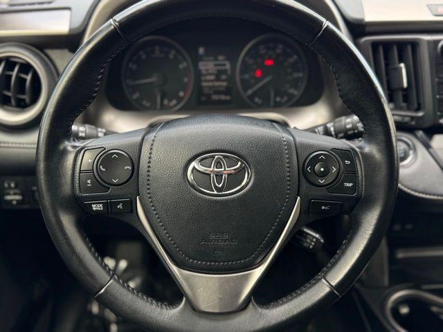 used 2018 Toyota RAV4 car, priced at $20,000