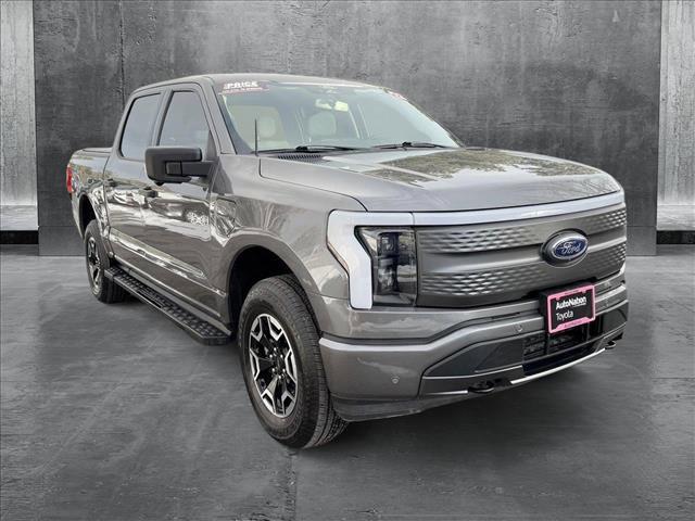 used 2022 Ford F-150 Lightning car, priced at $44,598