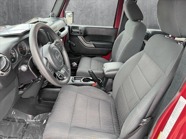 used 2012 Jeep Wrangler Unlimited car, priced at $14,798