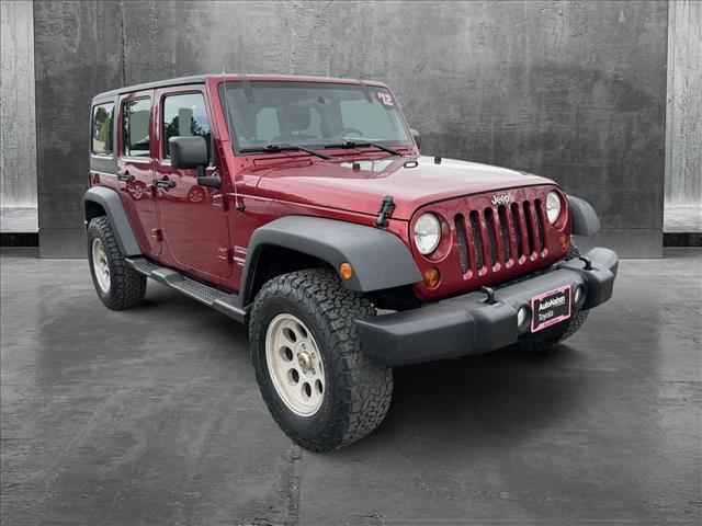 used 2012 Jeep Wrangler Unlimited car, priced at $14,798