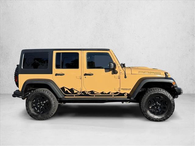 used 2013 Jeep Wrangler Unlimited car, priced at $19,798