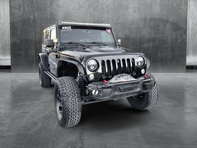 used 2016 Jeep Wrangler Unlimited car, priced at $27,798