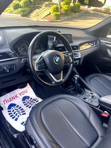 used 2018 BMW X1 car, priced at $13,500