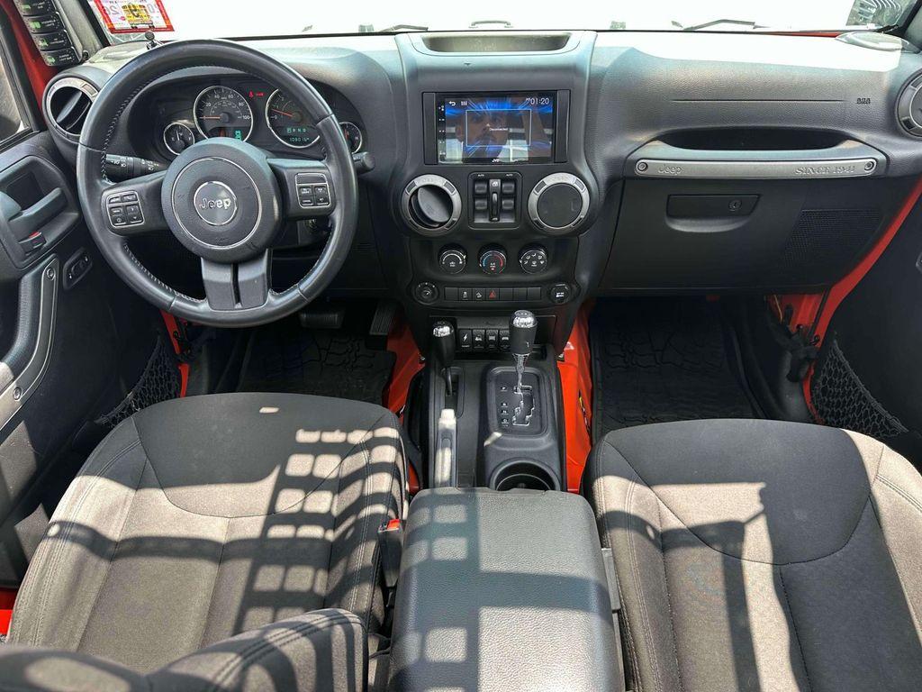 used 2015 Jeep Wrangler Unlimited car, priced at $16,304