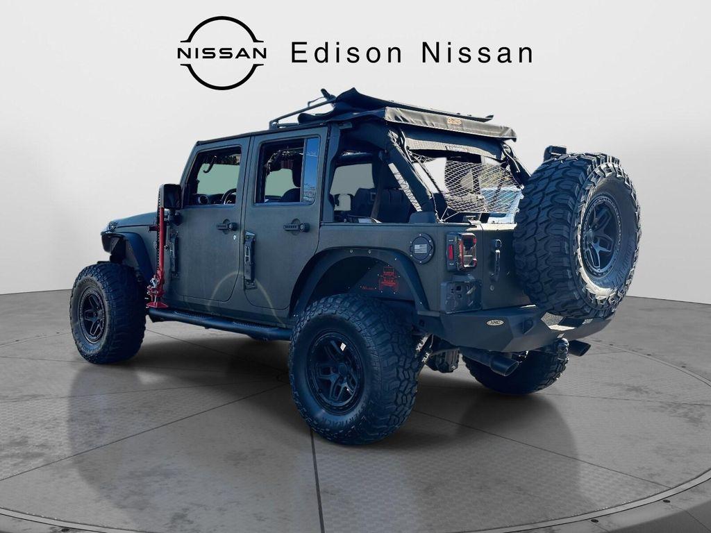 used 2015 Jeep Wrangler Unlimited car, priced at $16,304