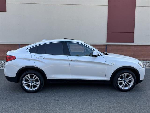 used 2016 BMW X4 car, priced at $10,995