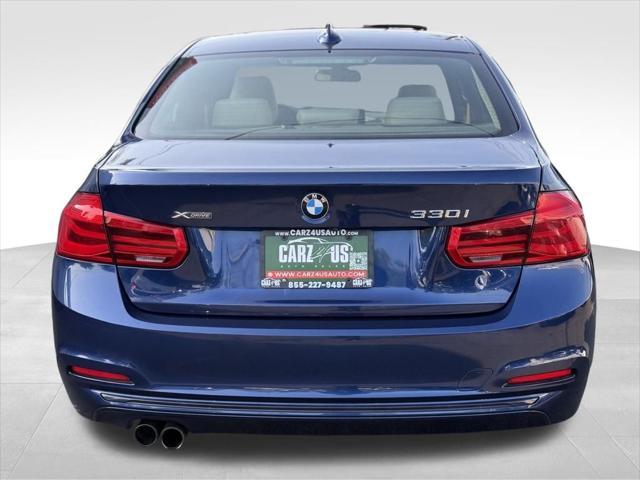 used 2018 BMW 330 car, priced at $13,998
