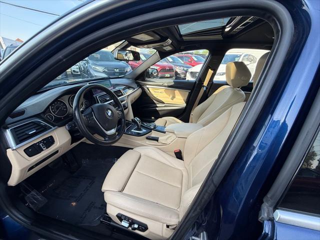 used 2018 BMW 330 car, priced at $13,998