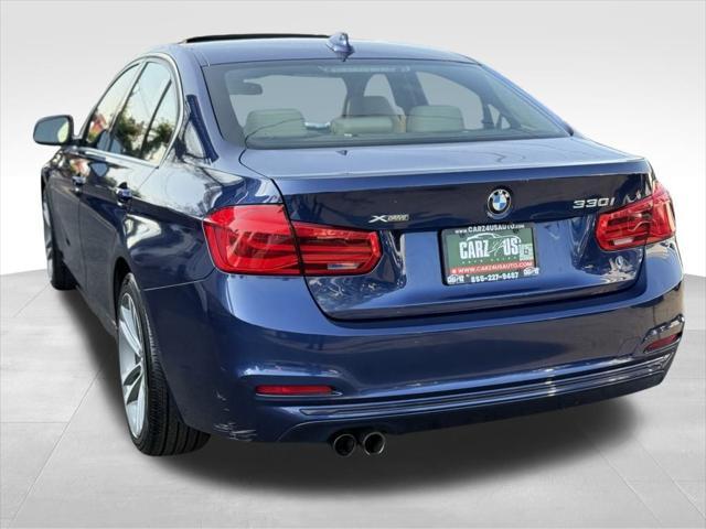 used 2018 BMW 330 car, priced at $13,998
