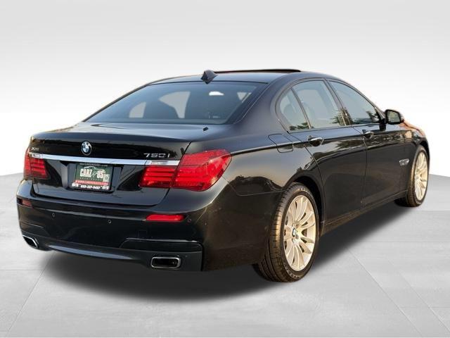used 2014 BMW 750 car, priced at $14,895
