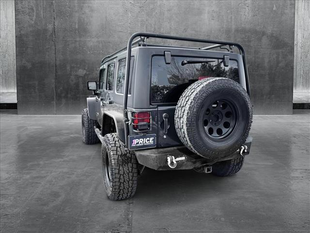 used 2016 Jeep Wrangler Unlimited car, priced at $18,410