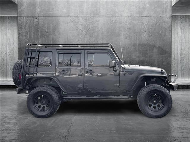 used 2016 Jeep Wrangler Unlimited car, priced at $18,410