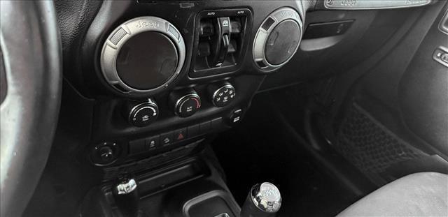 used 2016 Jeep Wrangler Unlimited car, priced at $18,410