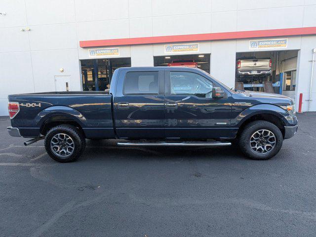 used 2014 Ford F-150 car, priced at $12,000