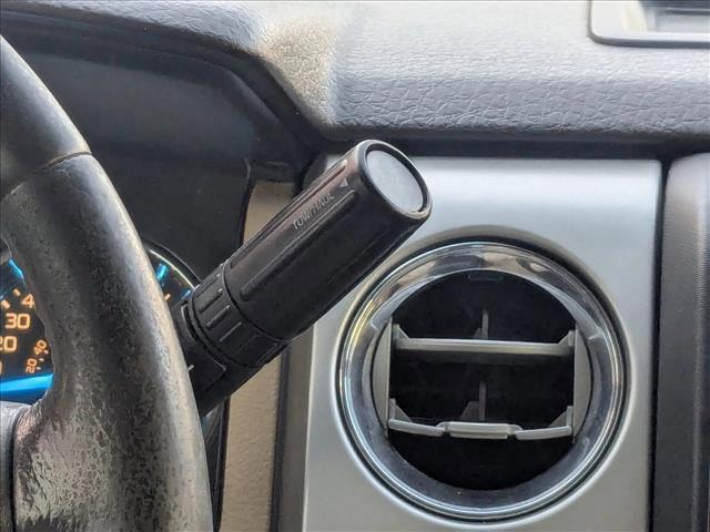 used 2014 Ford F-150 car, priced at $12,000