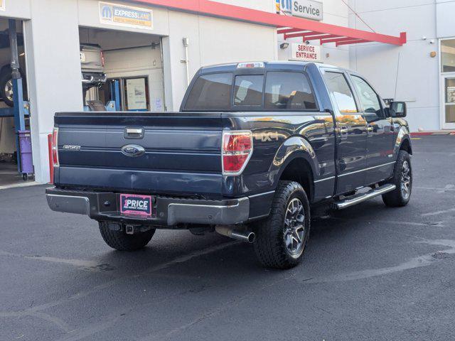 used 2014 Ford F-150 car, priced at $12,000