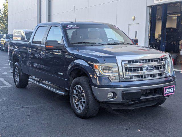 used 2014 Ford F-150 car, priced at $12,000