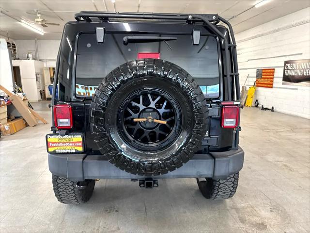 used 2015 Jeep Wrangler Unlimited car, priced at $19,900