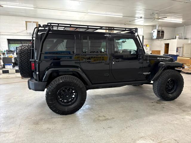 used 2015 Jeep Wrangler Unlimited car, priced at $19,900
