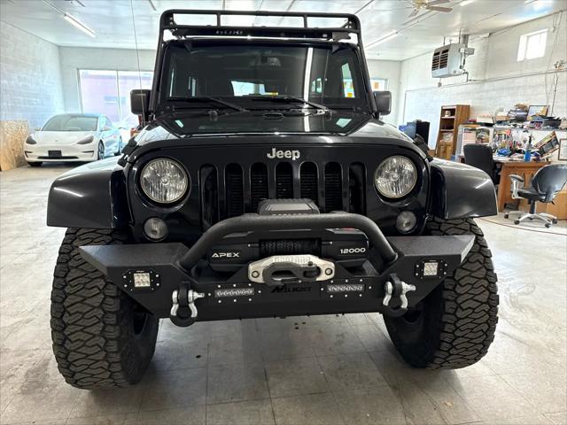 used 2015 Jeep Wrangler Unlimited car, priced at $19,900