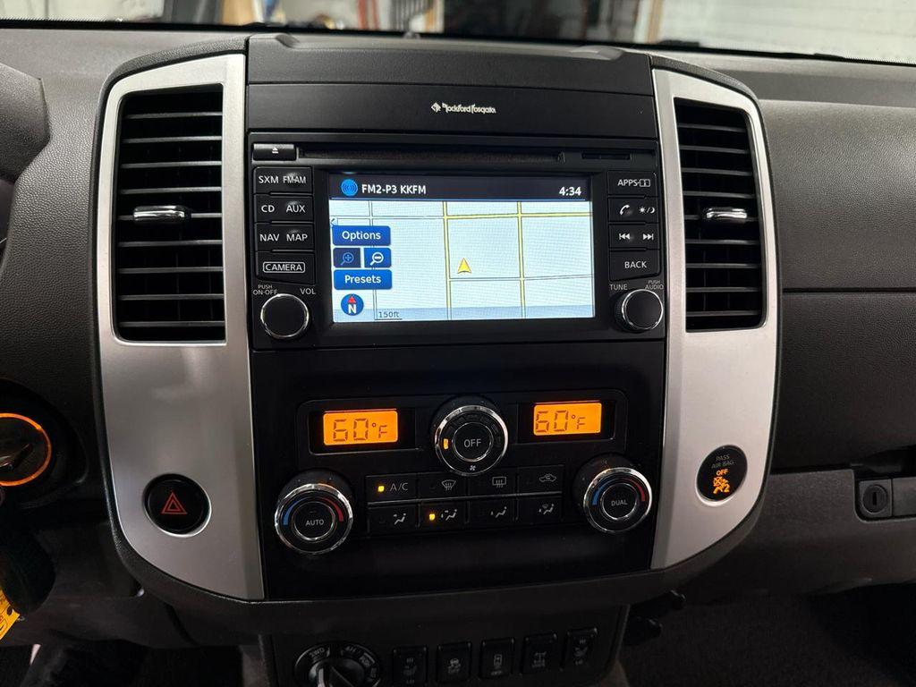 used 2014 Nissan Frontier car, priced at $19,900