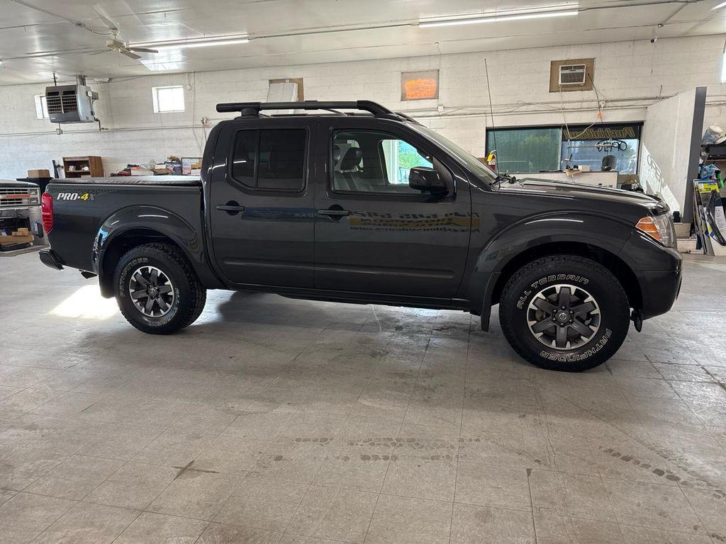 used 2014 Nissan Frontier car, priced at $19,900
