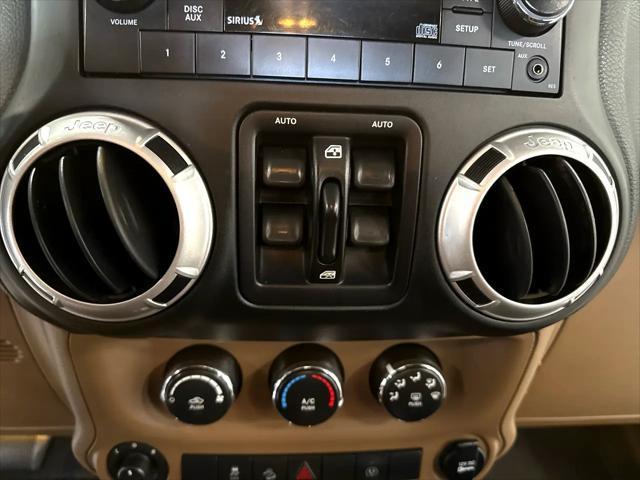 used 2015 Jeep Wrangler Unlimited car, priced at $19,900