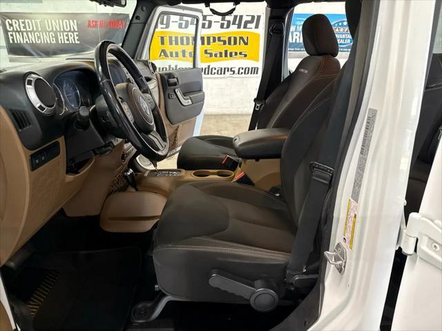 used 2015 Jeep Wrangler Unlimited car, priced at $19,900
