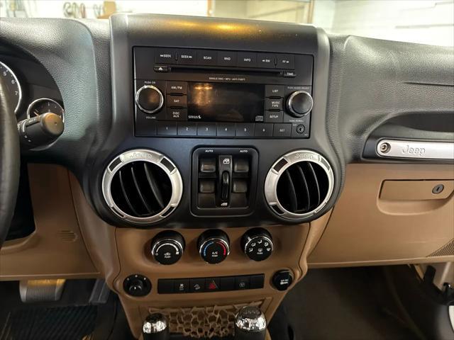 used 2015 Jeep Wrangler Unlimited car, priced at $19,900
