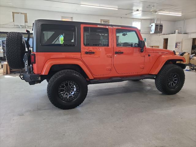 used 2015 Jeep Wrangler Unlimited car, priced at $26,900