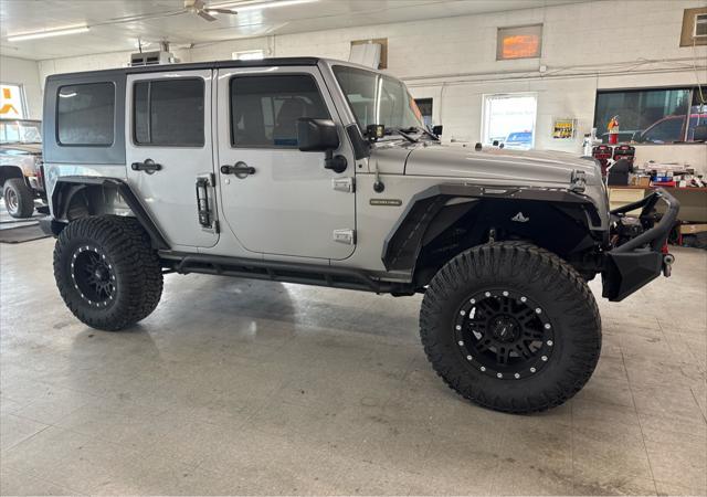 used 2016 Jeep Wrangler Unlimited car, priced at $21,900