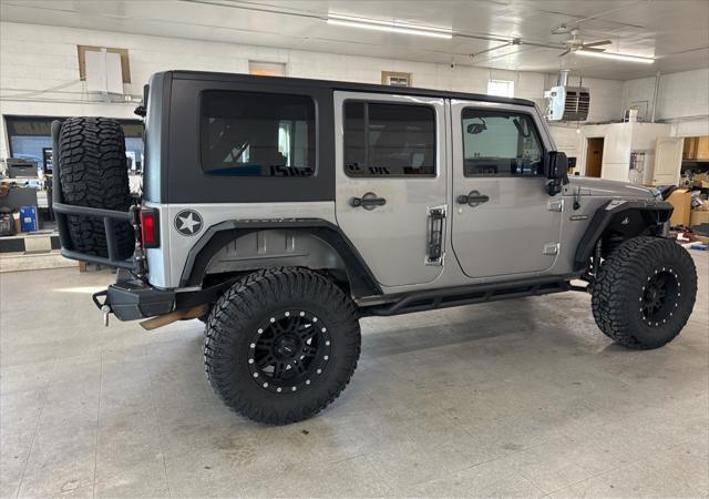 used 2016 Jeep Wrangler Unlimited car, priced at $21,900