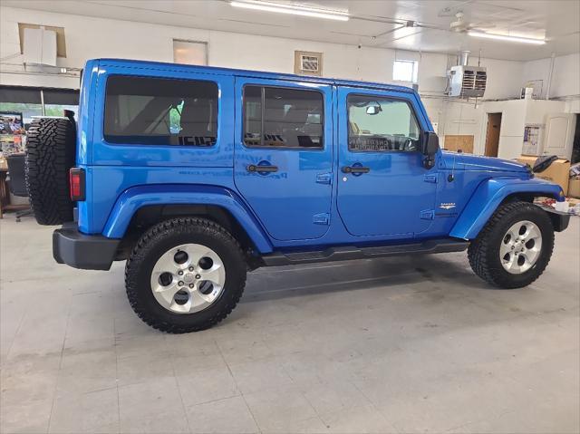 used 2015 Jeep Wrangler Unlimited car, priced at $22,900