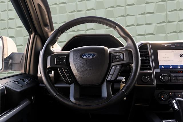 used 2019 Ford F-150 car, priced at $23,674